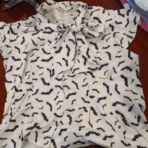 White with Black bats the top